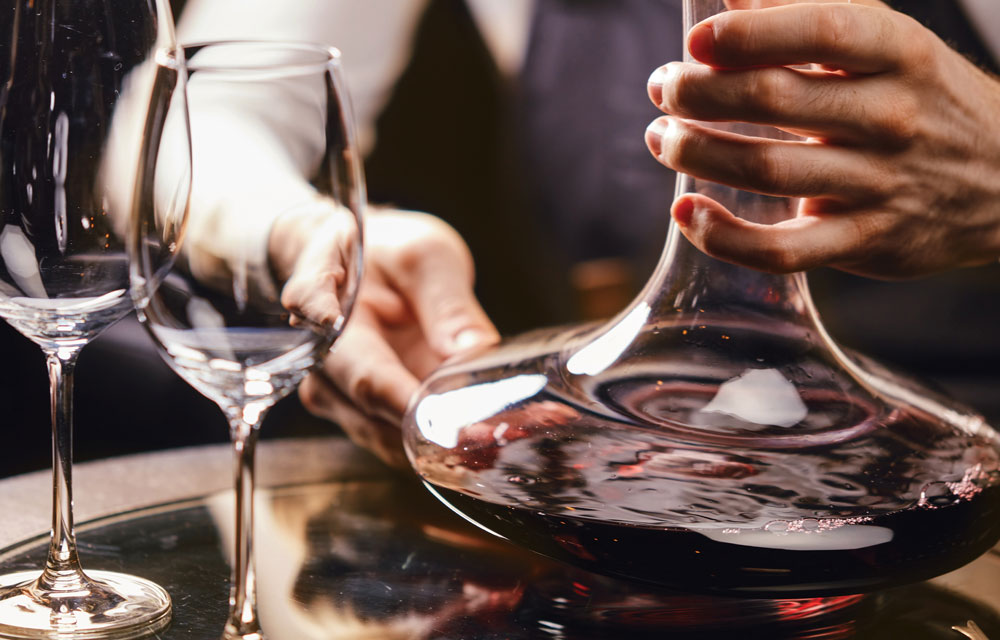 Quattro Theory carafe of wine with wine glasses